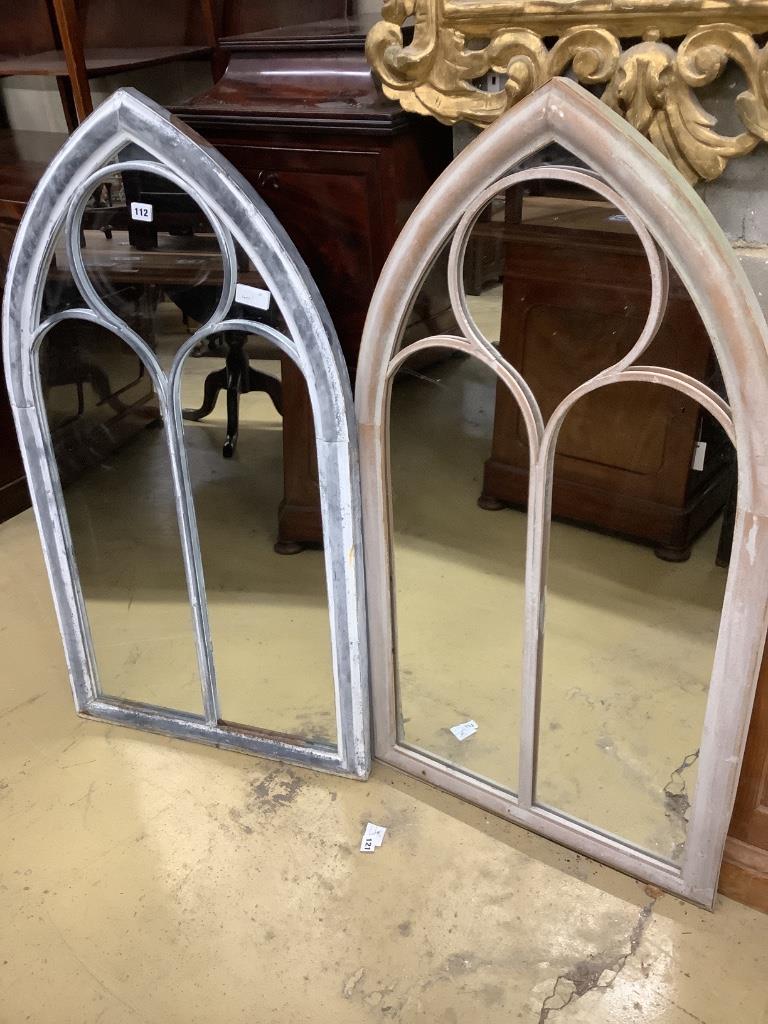 A pair of metal framed lancet arched wall mirrors, width 60cm height 110cm